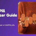 Travel pill organizer: pumpkin 7-day AM/PM pill box filled with colorful pills